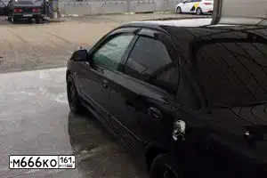 Фото автомобиля KIA SPECTRA, 2008 — госномер У292АМ761. Цвет: ЧЕРНЫЙ ЖЕМЧУГ