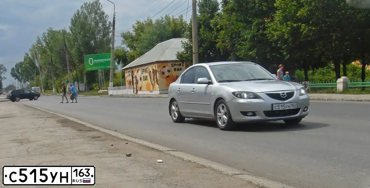 Фото автомобиля MAZDA 3, 2006 — госномер Е197АТ18. Цвет: СЕРЕБРИСТЫЙ