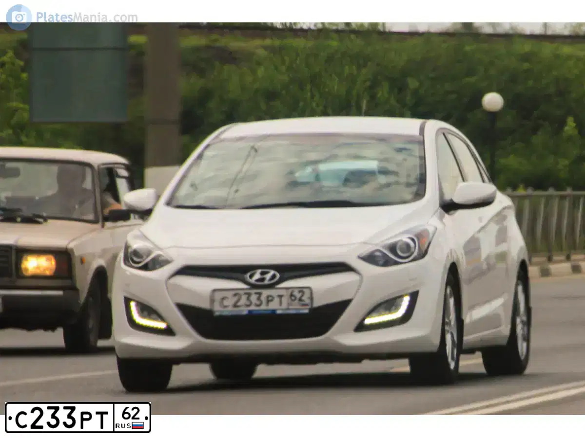 Фото автомобиля HYUNDAI I30, 2012 — госномер С233РТ62. Цвет: БЕЛЫЙ