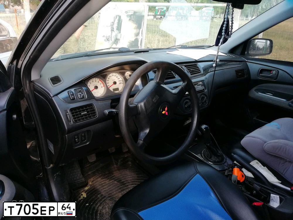 Фото автомобиля MITSUBISHI LANCER, 2004 — госномер Т668ВТ71. Цвет: ЧЕРНЫЙ
