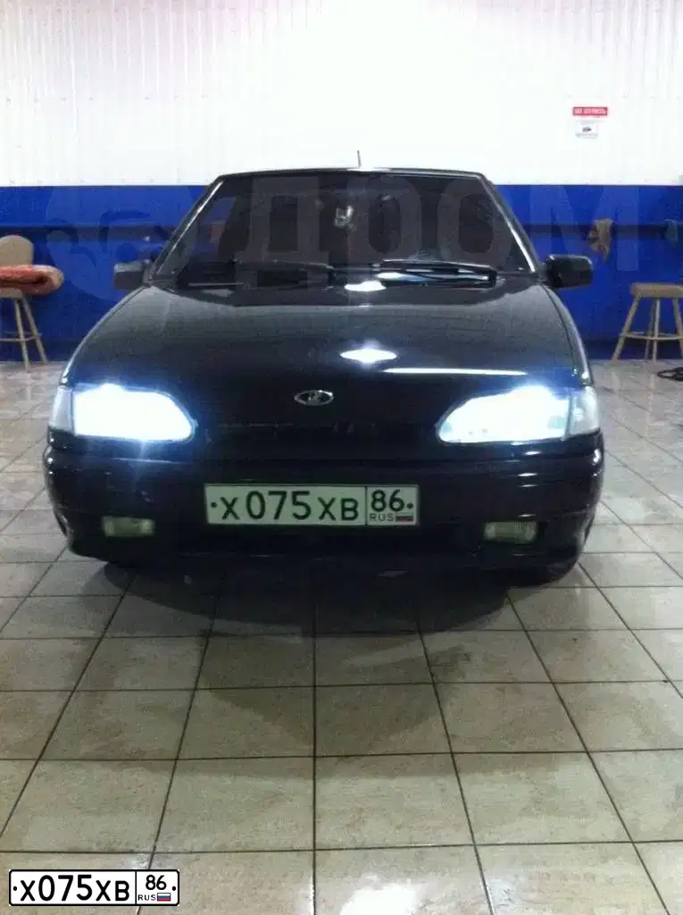 Фото автомобиля ВАЗ 211340, 2009 — госномер А827АХ155. Цвет: Темно-зеленый