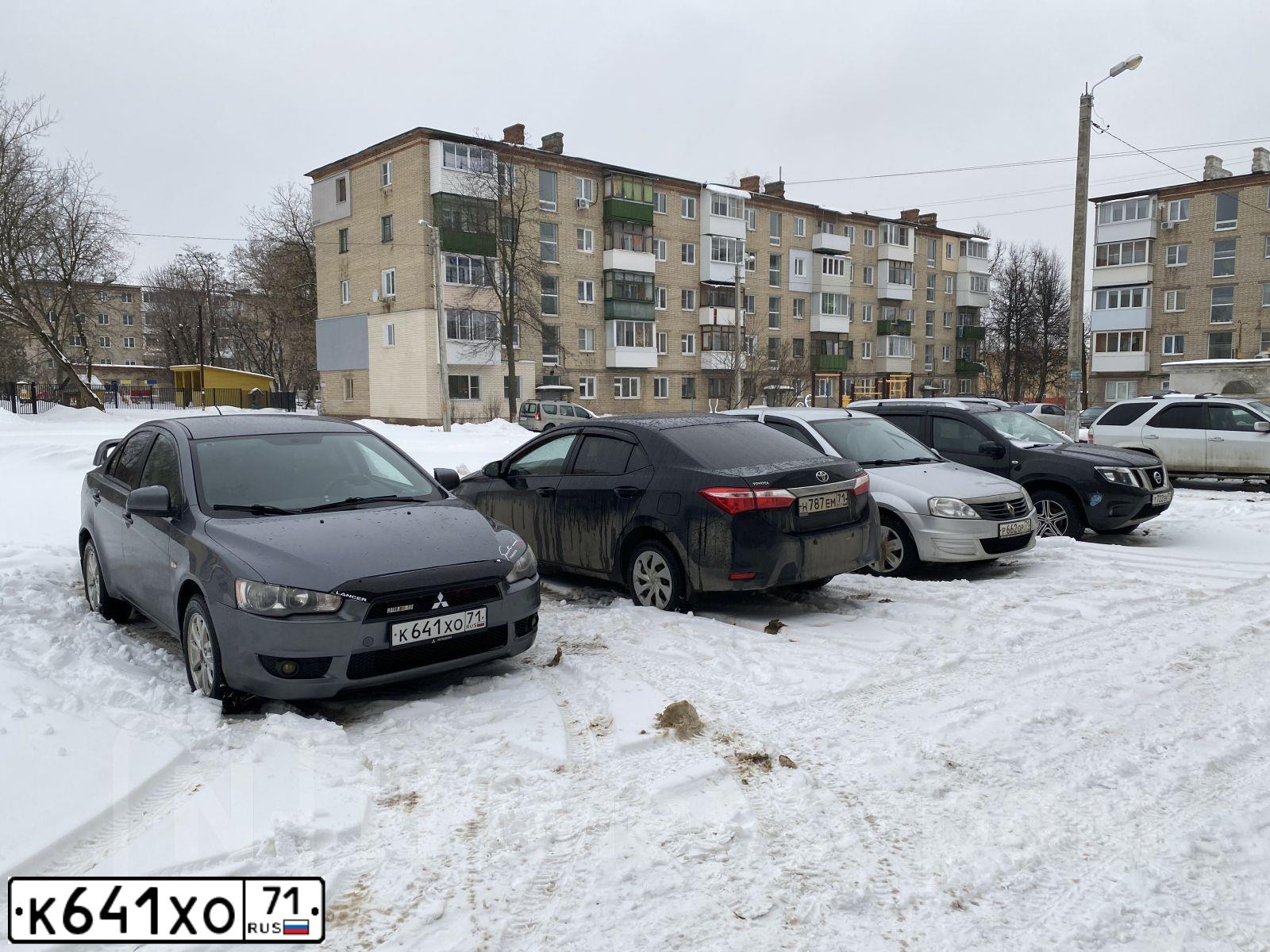 Фото автомобиля MITSUBISHI LANCER, 2010 — госномер К641ХО71. Цвет: СЕРЫЙ