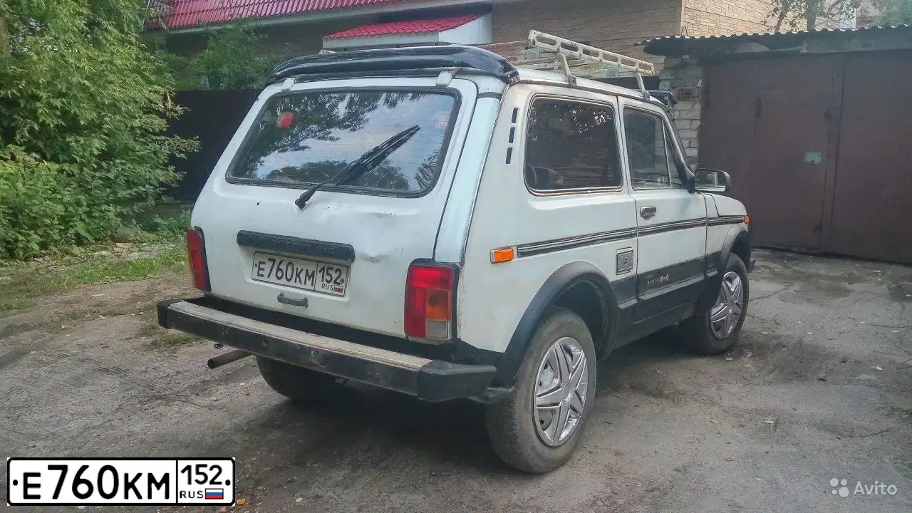 Фото автомобиля LADA 2121 NIVA, 1995 — госномер Е760КМ152. Цвет: БЕЛЫЙ
