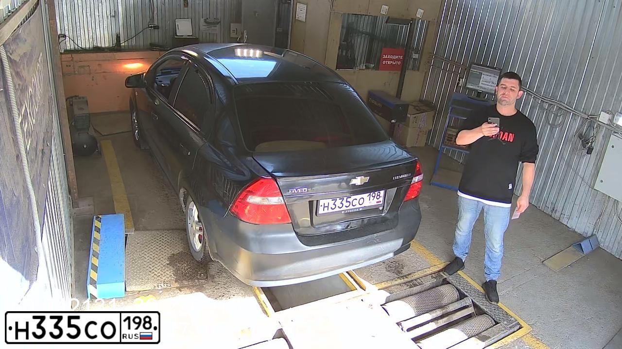 Фото автомобиля CHEVROLET AVEO, 2008 — госномер Н335СО198. Цвет: ЧЕРНЫЙ