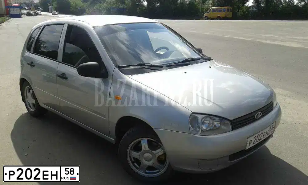 Фото автомобиля LADA 1119 KALINA, 2009 — госномер О456ЕН58. Цвет: СЕРЕБРИСТЫЙ