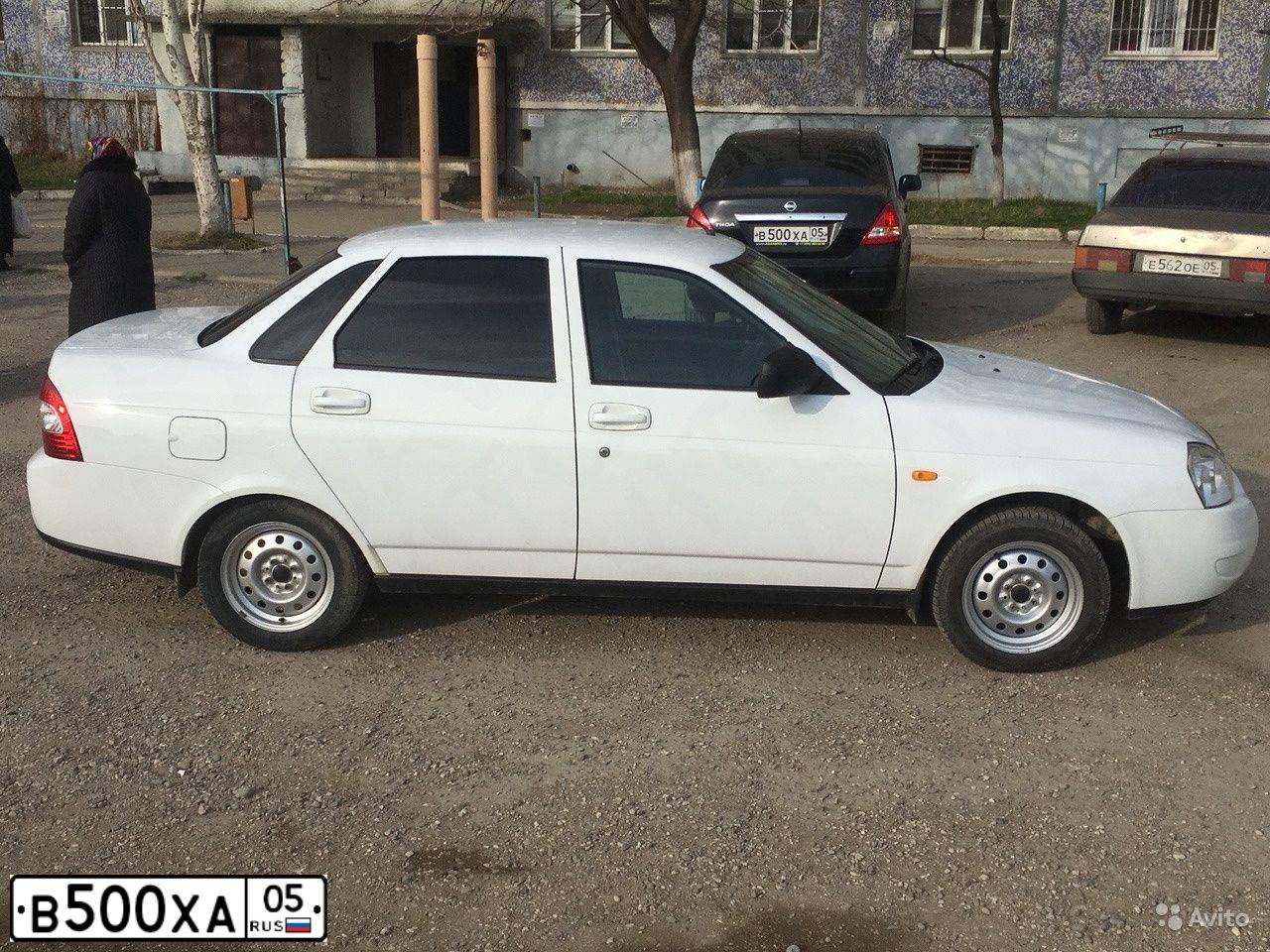 Фото автомобиля NISSAN TIIDA, 2010 — госномер В500ХА05. Цвет: ЧЕРНЫЙ