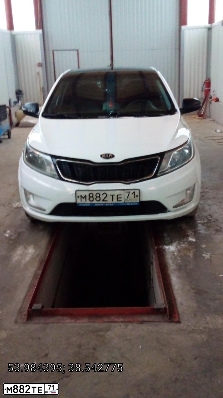Фото автомобиля KIA RIO, 2012 — госномер М882ТЕ71. Цвет: БЕЛЫЙ