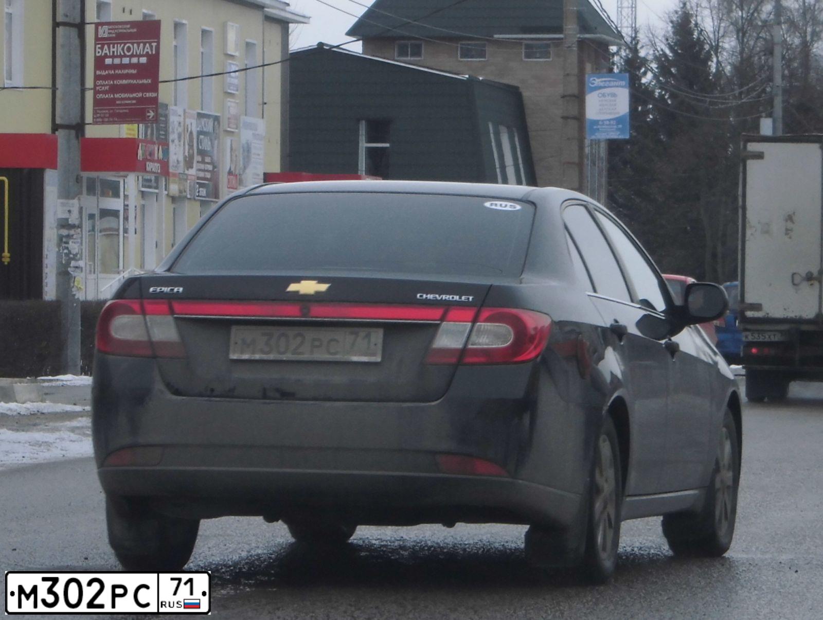 Фото автомобиля CHEVROLET EPICA, 2010 — госномер М302РС71. Цвет: ЧЕРНЫЙ
