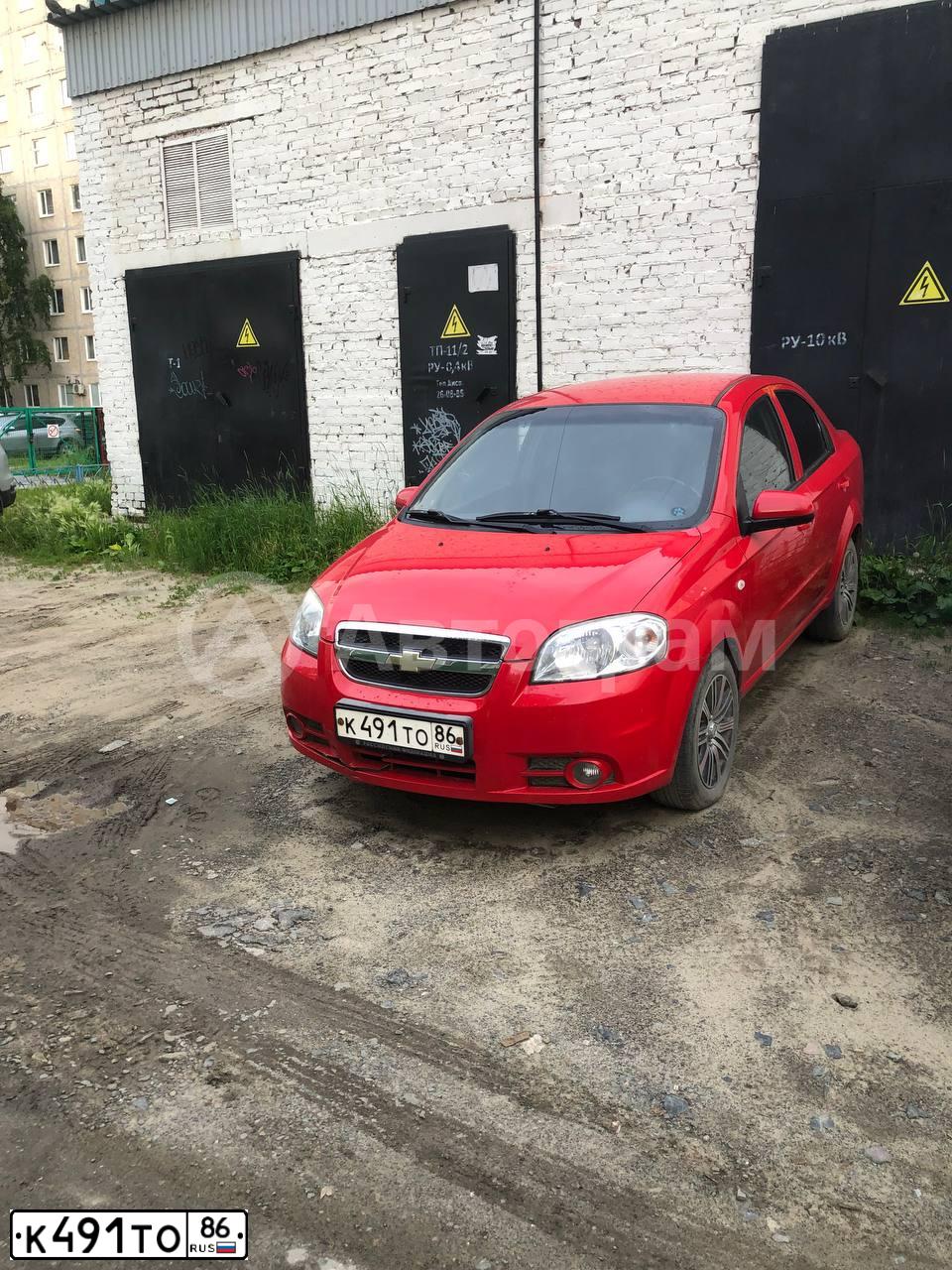 Фото автомобиля CHEVROLET AVEO, 2009 — госномер К491ТО86. Цвет: КРАСНЫЙ