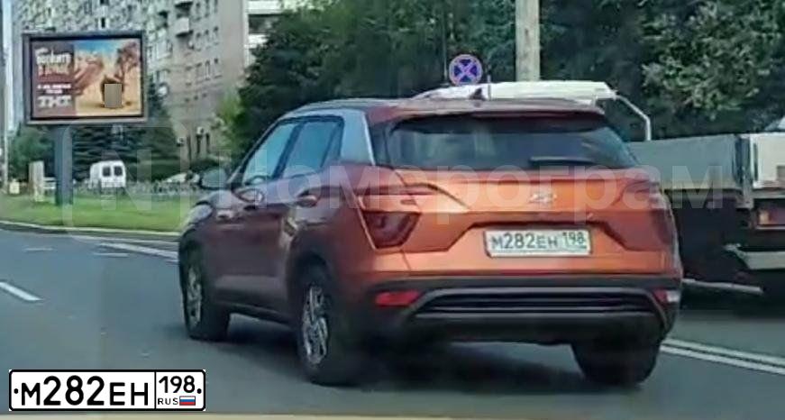 Фото автомобиля HYUNDAI CRETA, 2021 — госномер М282ЕН198. Цвет: Оранжевый