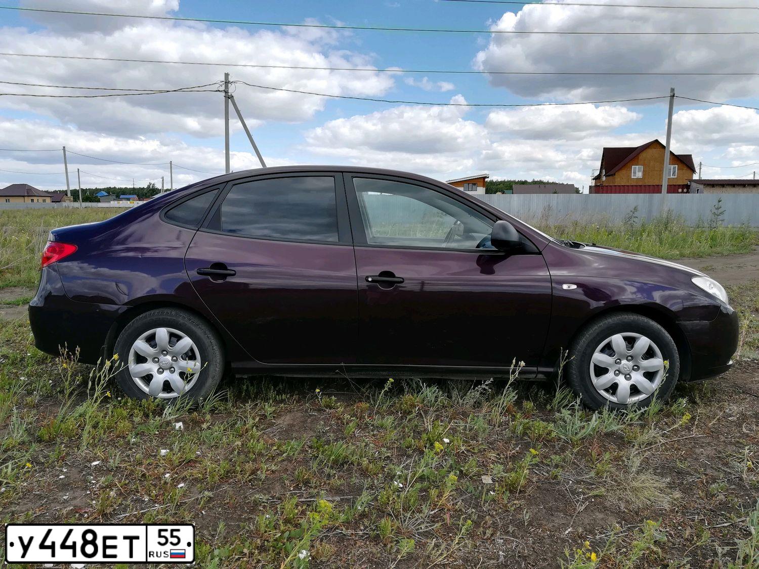 Фото автомобиля HYUNDAI ELANTRA, 2008 — госномер У448ЕТ55. Цвет: ТЕМНО КРАСНЫЙ