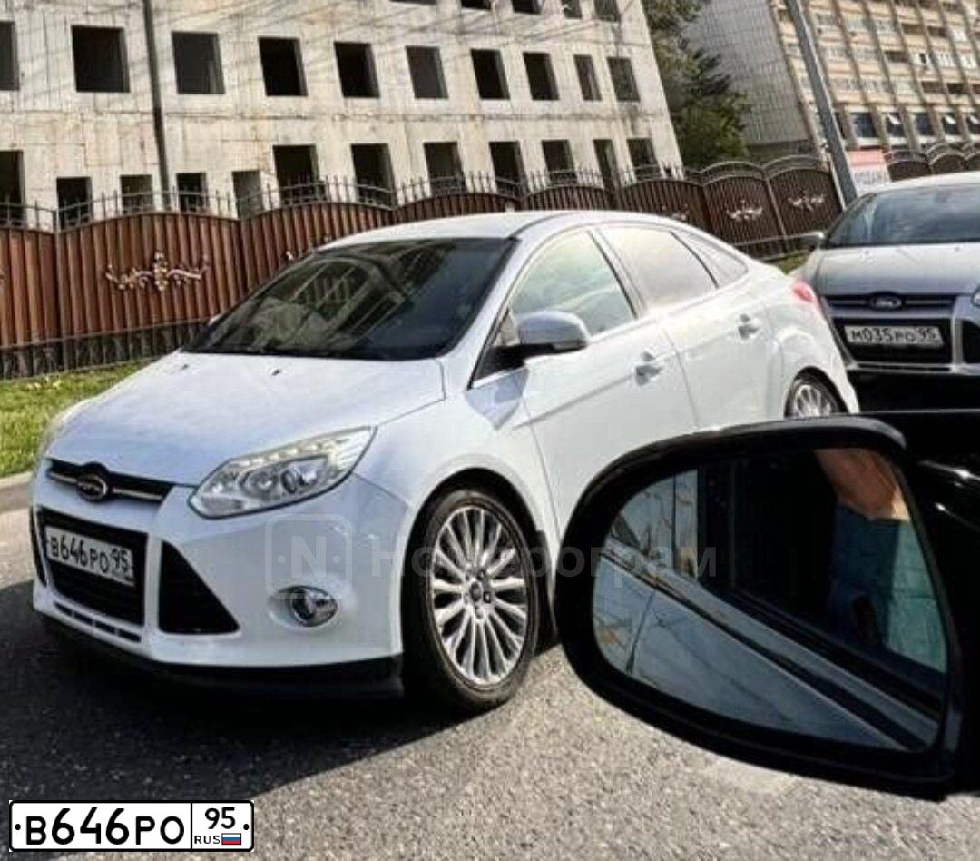 Фото автомобиля FORD FOCUS, 2012 — госномер Х007АХ95. Цвет: Белый