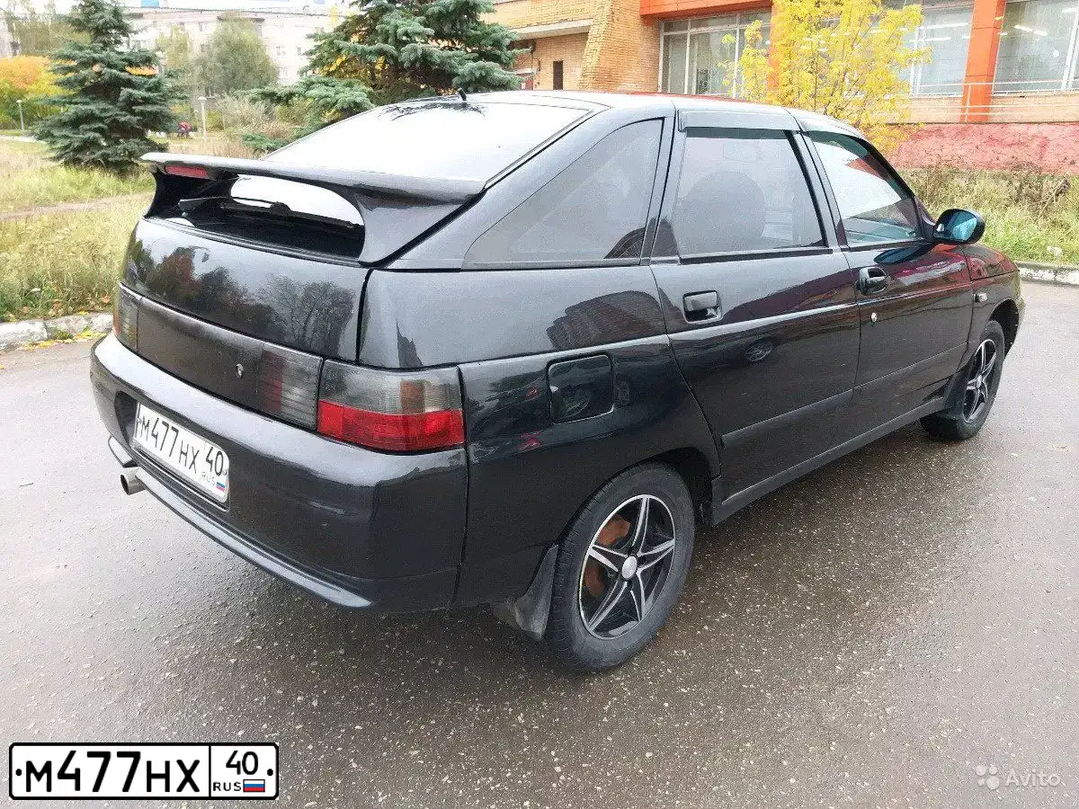 Фото автомобиля LADA 2112, 2005 — госномер М477НХ40. Цвет: ГРАФИТОВЫЙ МЕТАЛЛИК