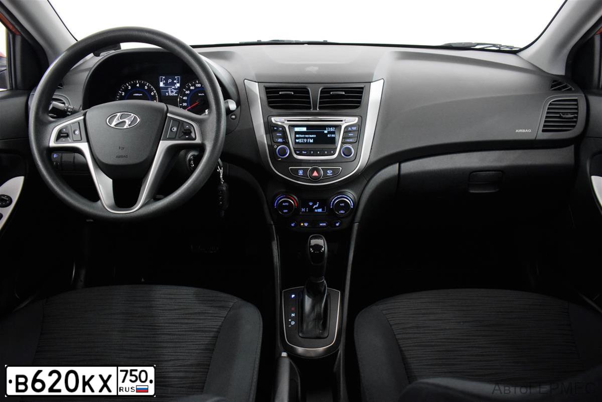 Фото автомобиля HYUNDAI SOLARIS, 2015 — госномер В620КХ750. Цвет: Оранжевый