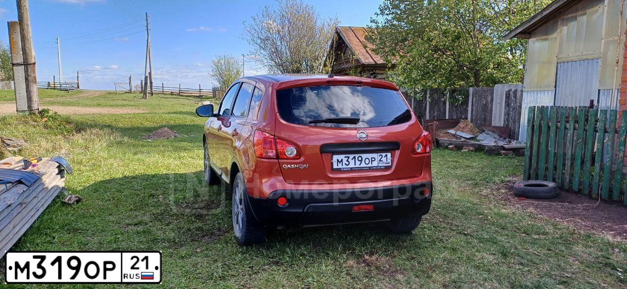 Фото автомобиля NISSAN QASHQAI, 2009 — госномер М319ОР21. Цвет: ТЕМНО-КРАСНЫЙ