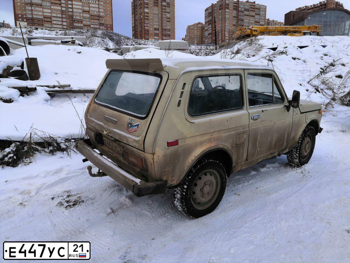 Фото автомобиля LADA 1117 KALINA, 2012 — госномер Е447УС21. Цвет: Сине-Черный