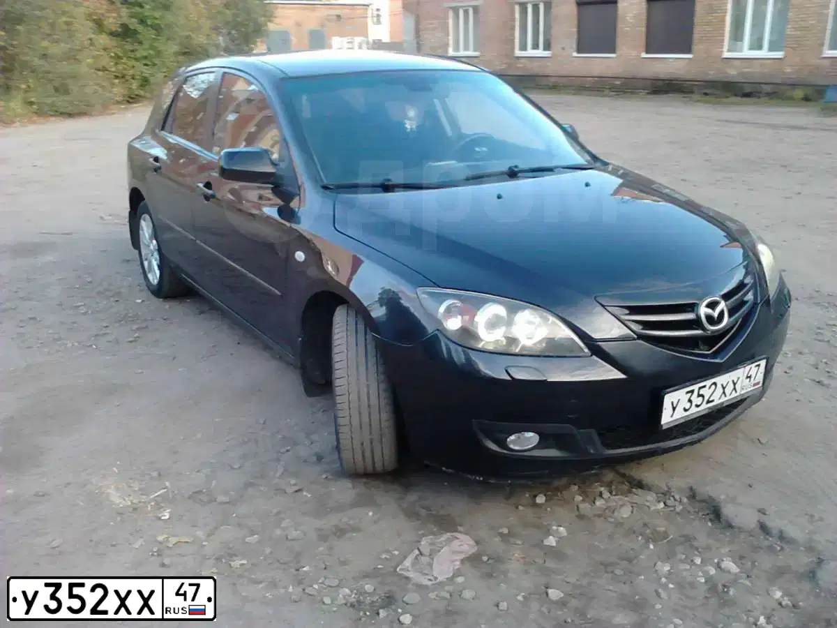 Фото автомобиля MAZDA 3, 2005 — госномер К148РА35. Цвет: ЧЕРНЫЙ