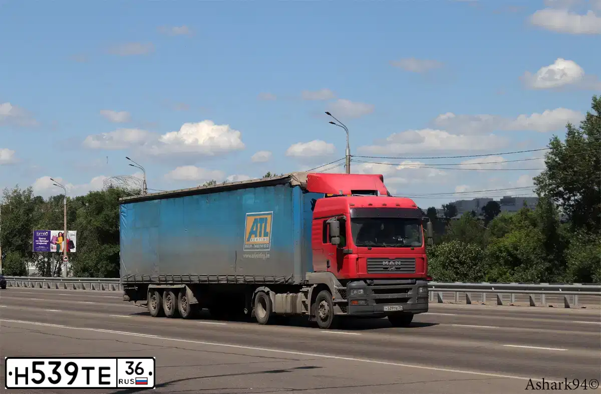 Фото автомобиля MAN TGA 19.XXX /4X2/, 2008 — госномер Н539ТЕ36. Цвет: КРАСНЫЙ