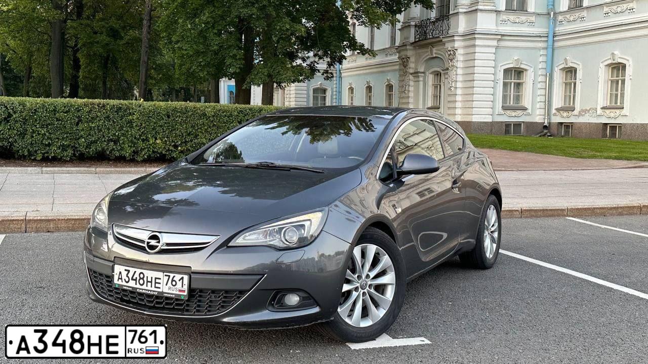 Фото автомобиля OPEL ASTRA GTC, 2012 — госномер Н049МО21