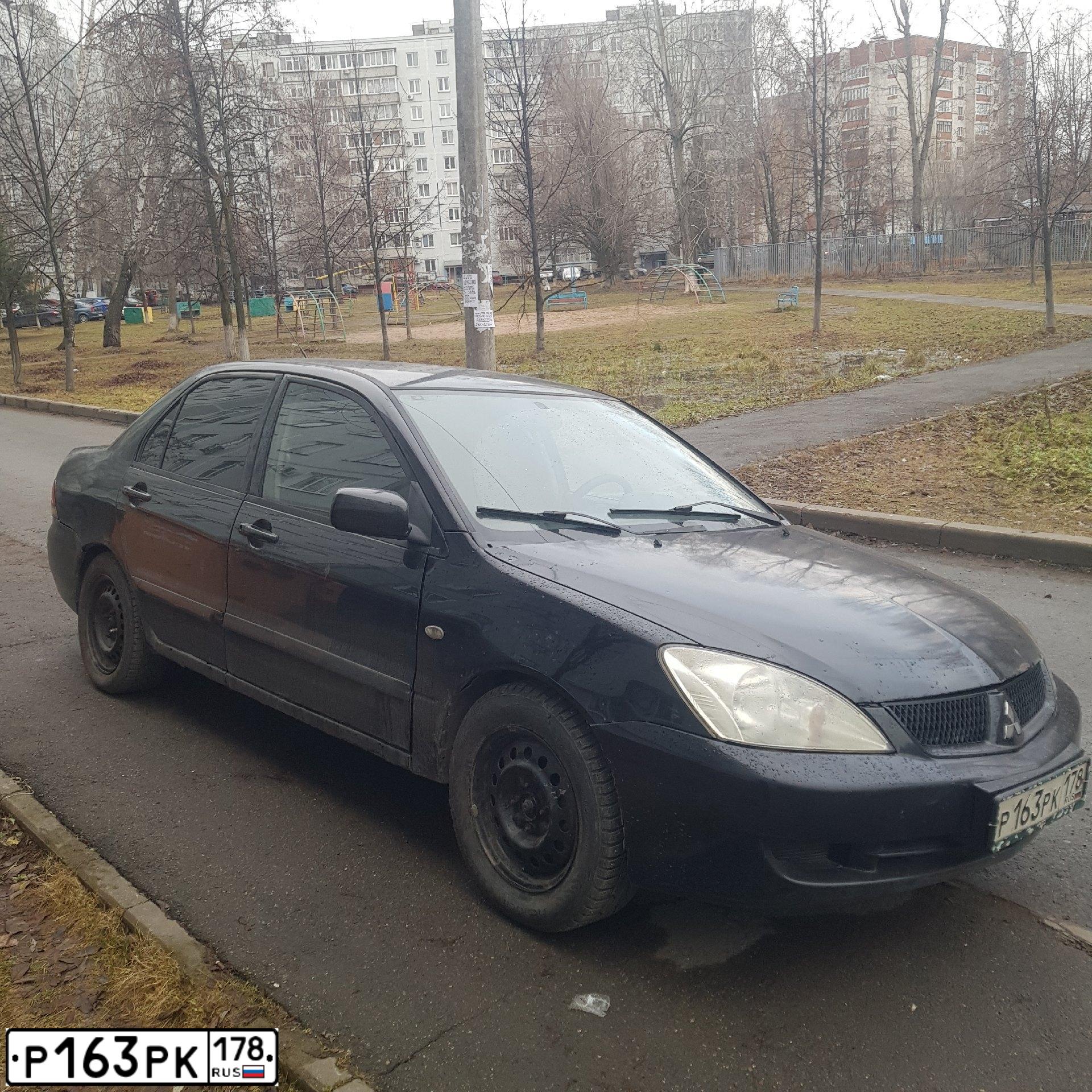 Фото автомобиля MITSUBISHI LANCER, 2007 — госномер Р163РК178. Цвет: ЧЕРНЫЙ