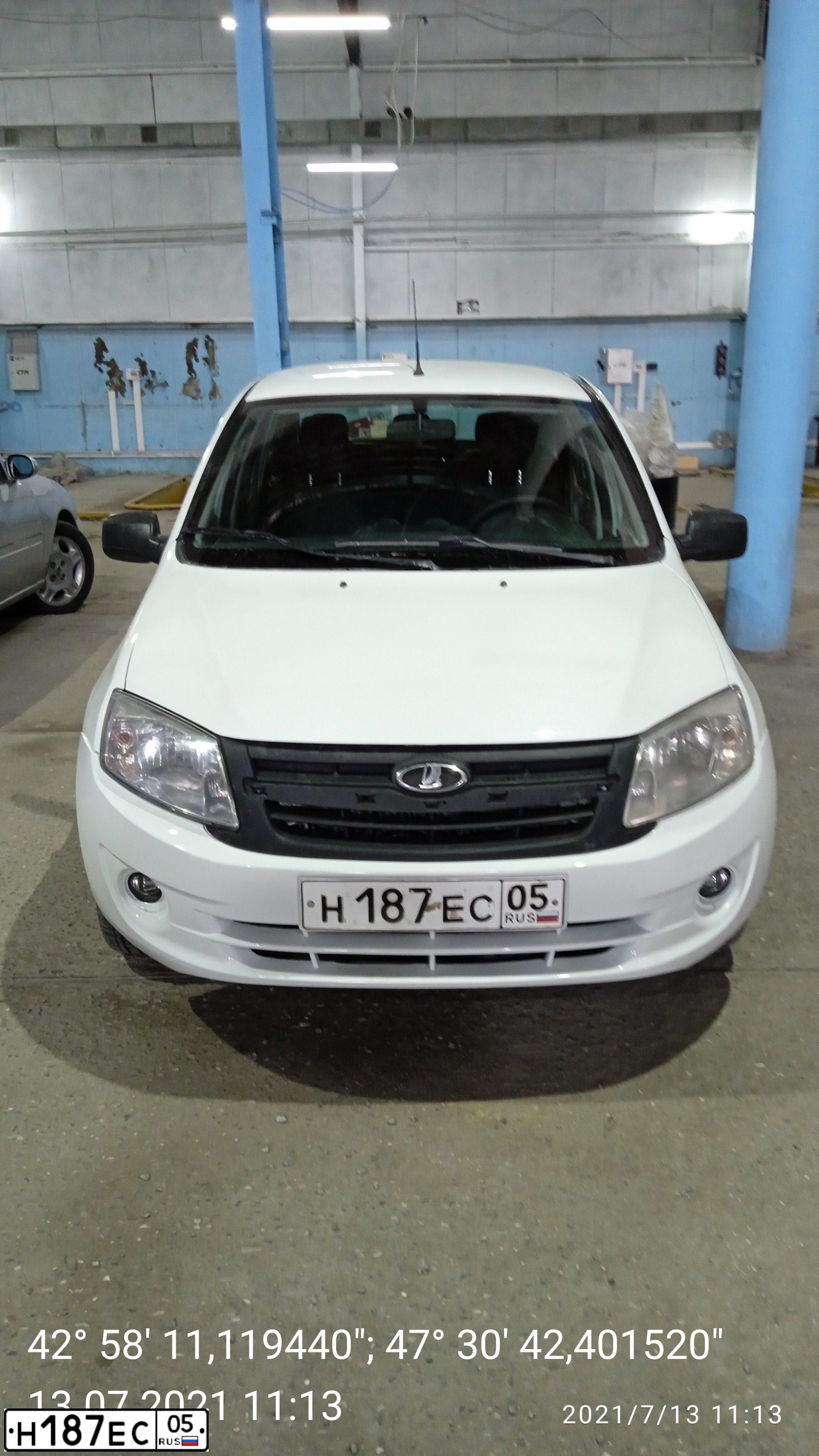 Фото автомобиля LADA 2190 GRANTA, 2013 — госномер Р139НН05. Цвет: Белый