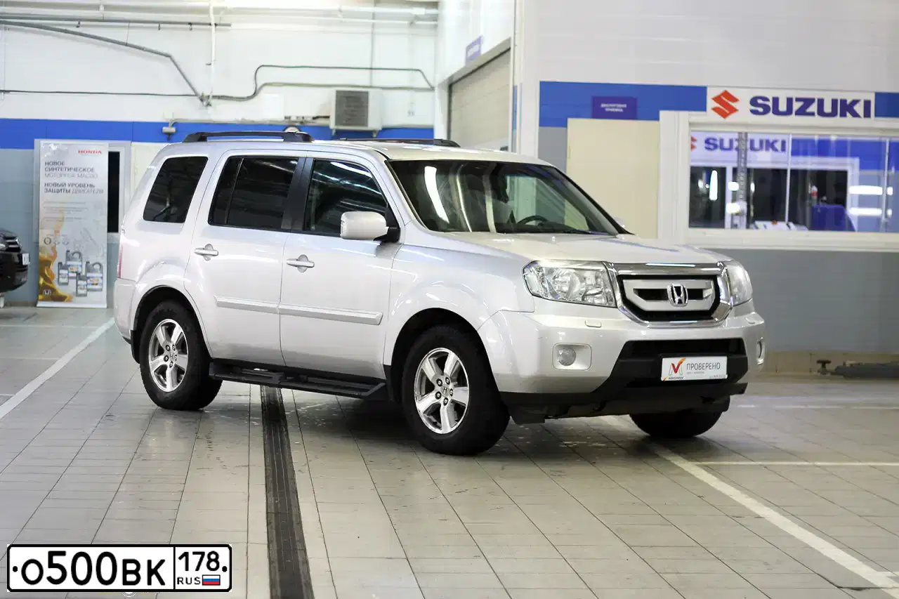 Фото автомобиля HONDA PILOT, 2008 — госномер О530ХЕ98. Цвет: СЕРЕБРИСТЫЙ