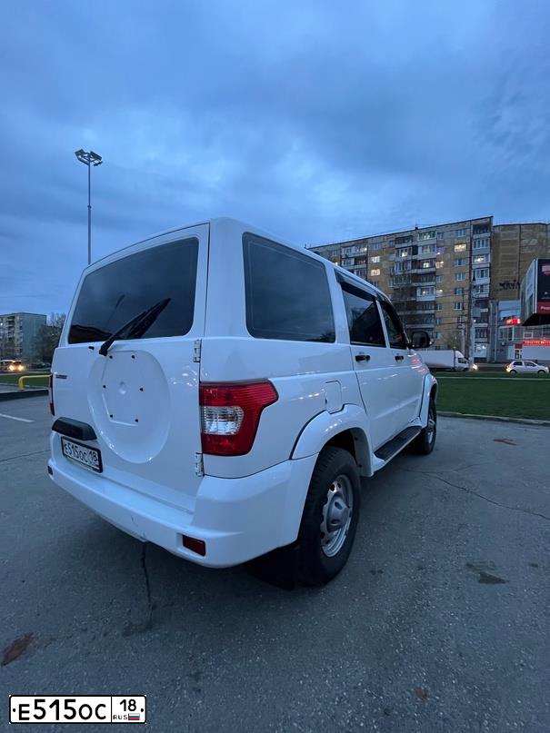 Фото автомобиля UAZ PATRIOT, 2019 — госномер Р469ЕР774. Цвет: Белый НЕМЕТАЛЛИК