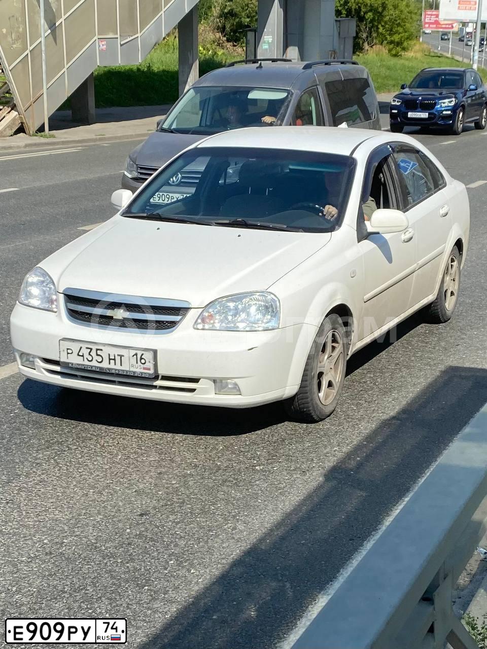 Фото автомобиля LADA 2111, 2000 — госномер Е909РУ74. Цвет: РОЗОВО БЕЖЕВЫЙ