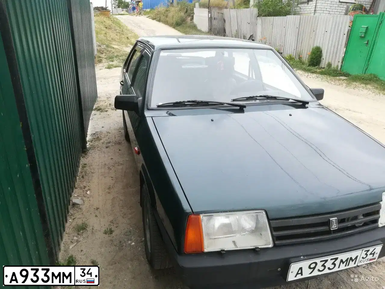 Фото автомобиля LADA 2109 SAMARA, 2002 — госномер А933ММ34. Цвет: ТЕМНО ЗЕЛЕНЫЙ