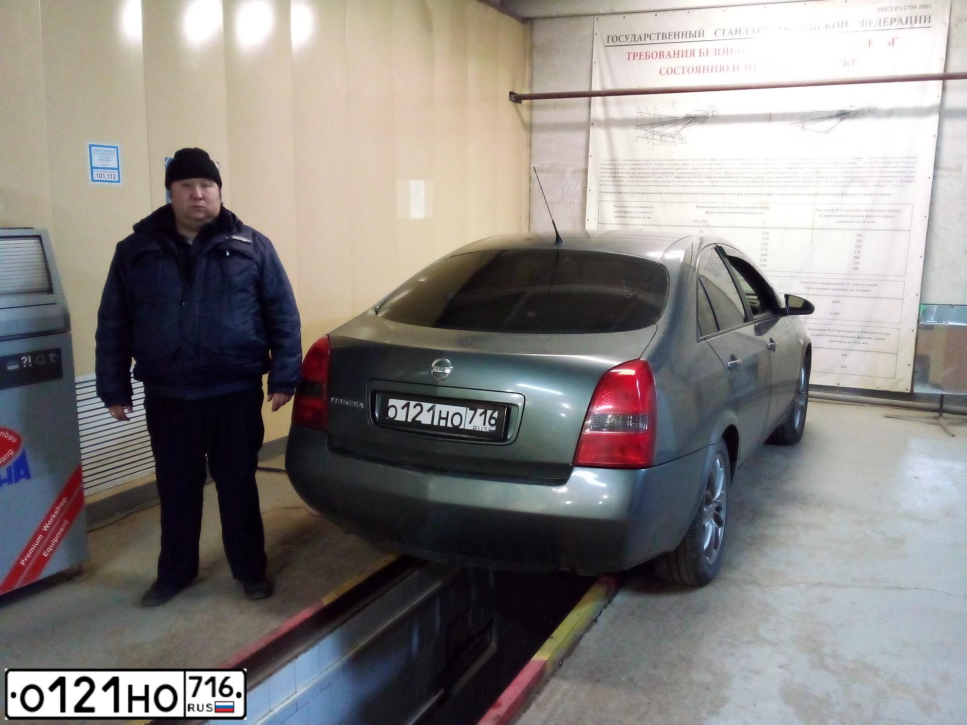 Фото автомобиля NISSAN PRIMERA, 2004 — госномер О121НО716. Цвет: СЕРЫЙ