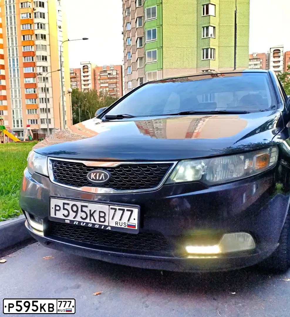 Фото автомобиля KIA CERATO, 2012 — госномер Р848УР190. Цвет: ЧЕРНЫЙ