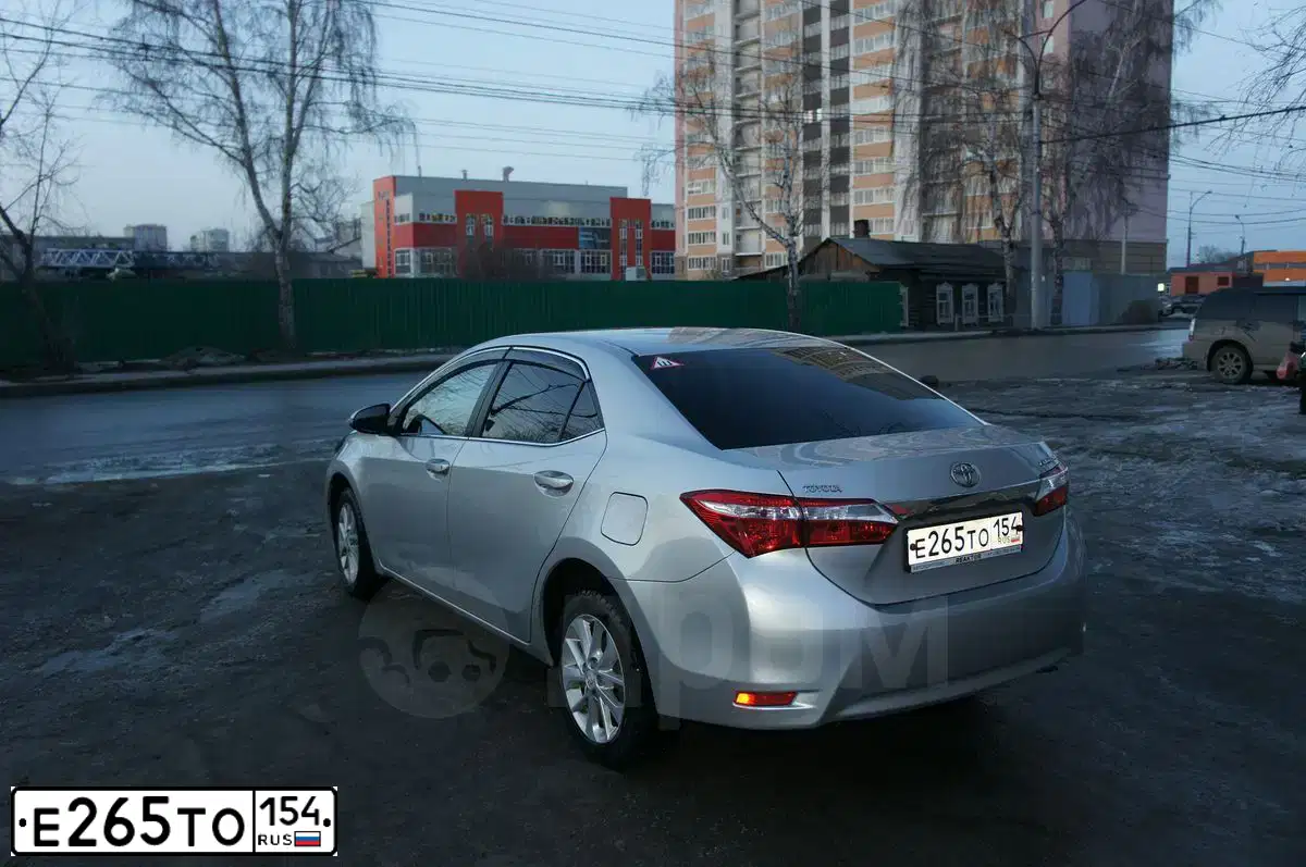 Фото автомобиля TOYOTA COROLLA, 2013 — госномер Т548УМ116. Цвет: СЕРЕБРИСТЫЙ