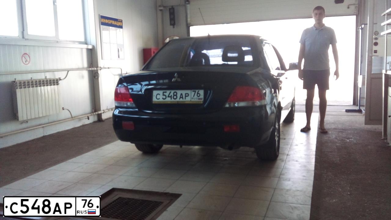 Фото автомобиля MITSUBISHI LANCER, 2006 — госномер У228ОН33. Цвет: ЧЕРНЫЙ
