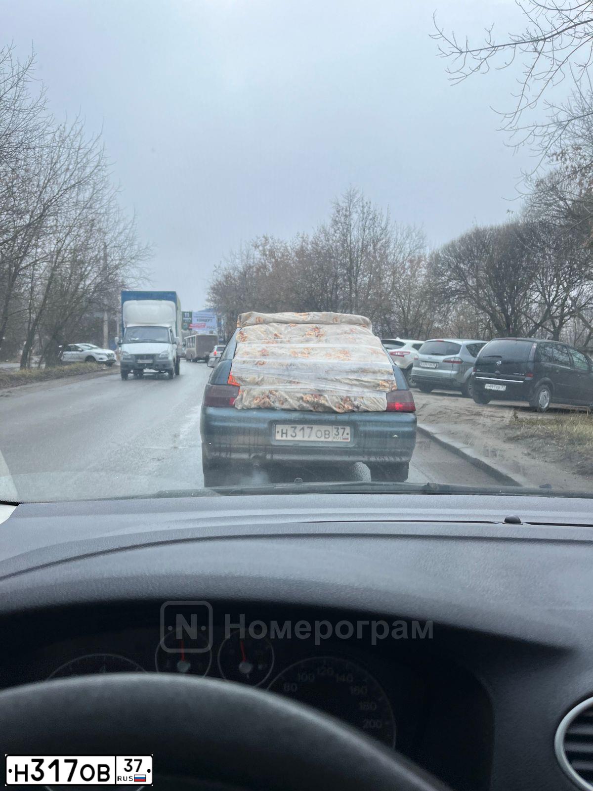 Фото автомобиля LADA 2112 LADA, 2000 — госномер Н317ОВ37. Цвет: СЕРЫЙ