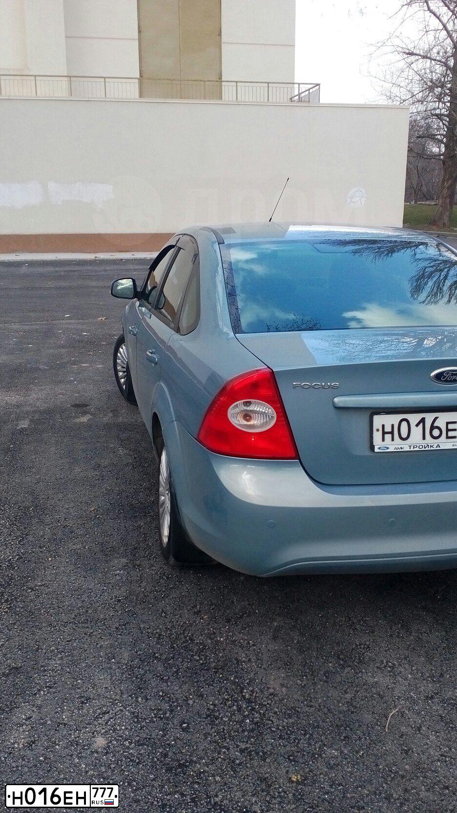 Фото автомобиля FORD FOCUS, 2010 — госномер Е618ХА82. Цвет: СЕРО-ГОЛУБОЙ