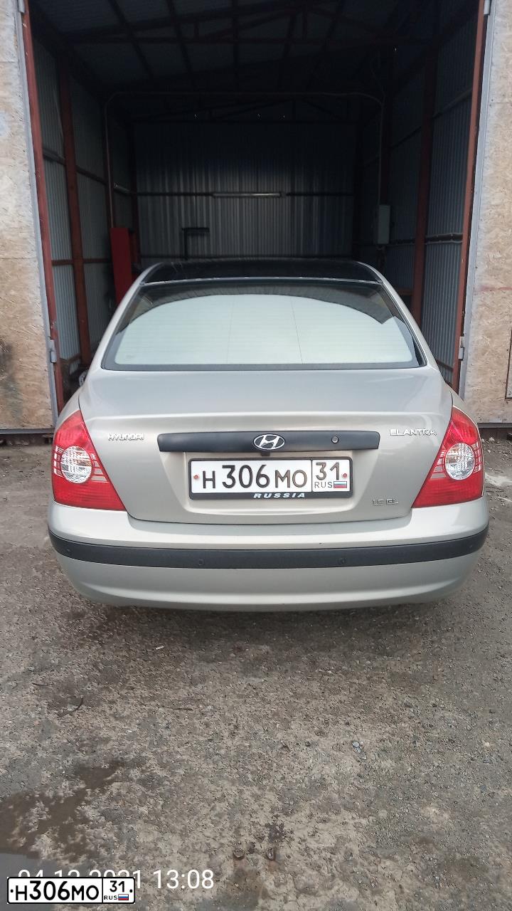 Фото автомобиля TAGAZ ELANTRA XD, 2010 — госномер Н306МО31. Цвет: СВЕТЛО-БЕЖЕВЫЙ