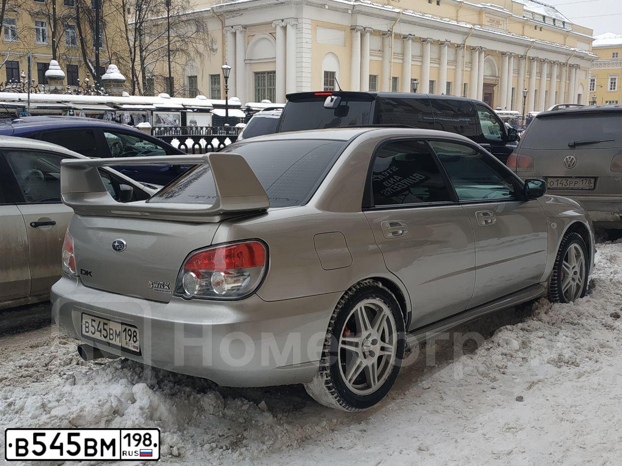 Фото автомобиля SUBARU IMPREZA, 2006 — госномер У040СО24. Цвет: Серый