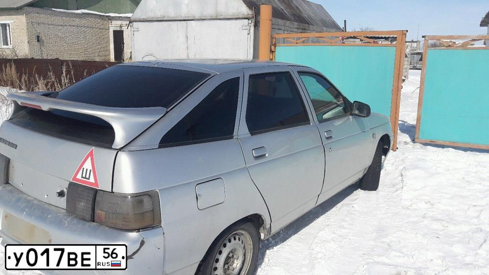 Фото автомобиля LADA 2112, 2003 — госномер О153ВТ89. Цвет: Светло-серебристый металик