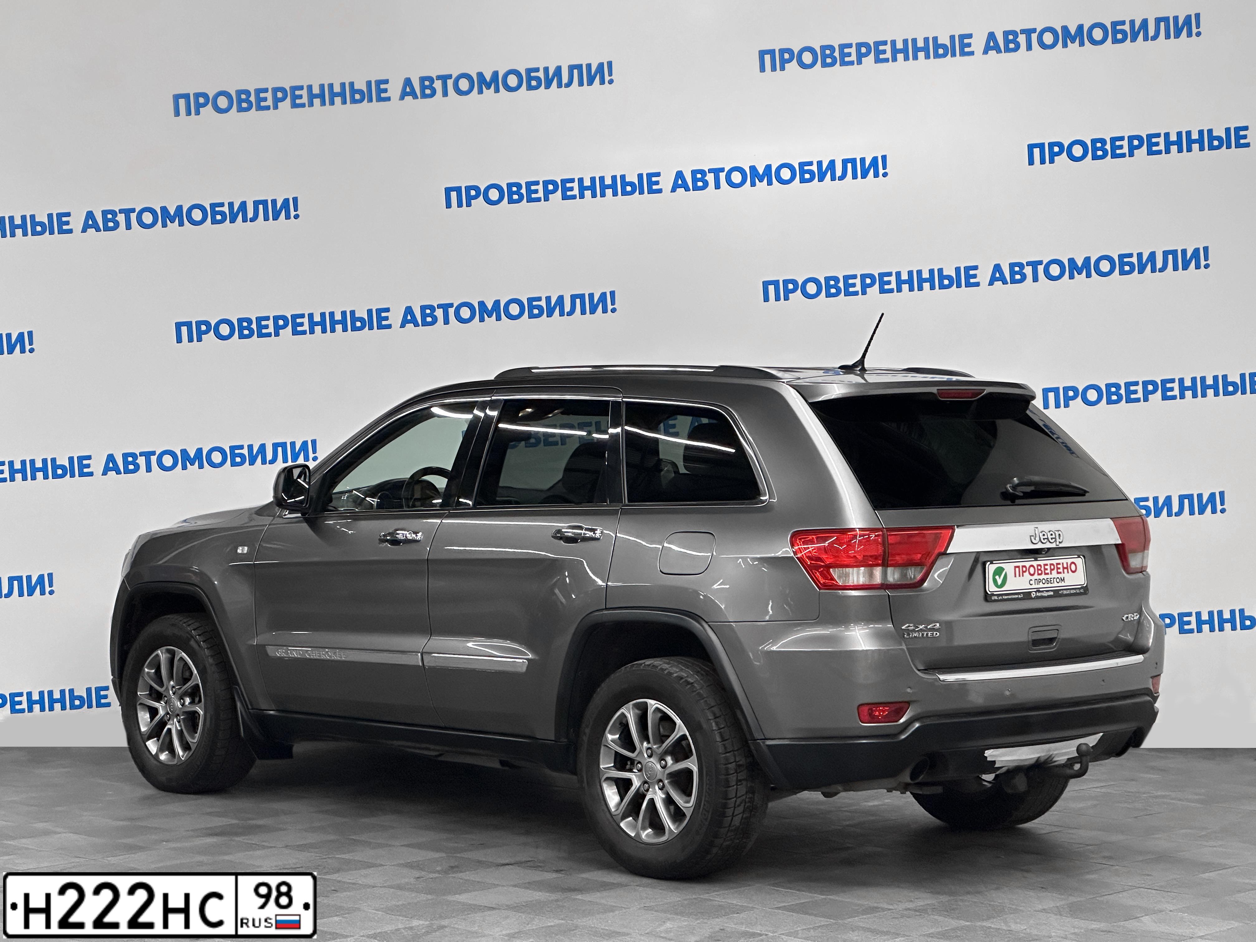 Фото автомобиля JEEP GRAND CHEROKEE, 2012 — госномер Е375МН147. Цвет: СЕРЫЙ