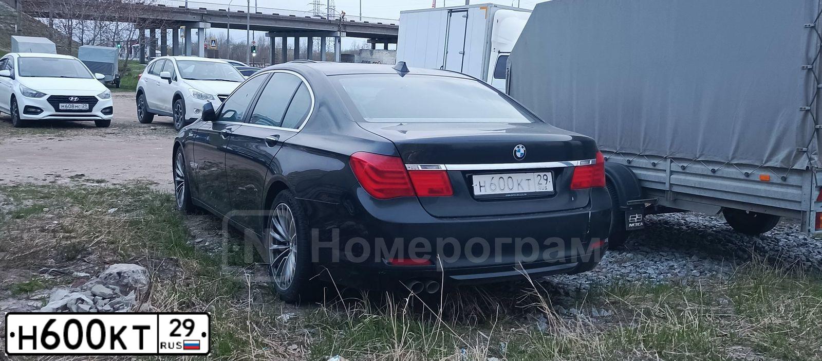 Фото автомобиля BMW SERIE 7, 2009 — госномер Н600КТ29. Цвет: ЧЕРНЫЙ