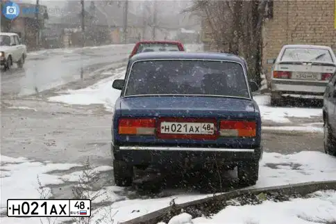 Фото автомобиля CHEVROLET NIVA, 2007 — госномер Е800КУ126. Цвет: Серебристый