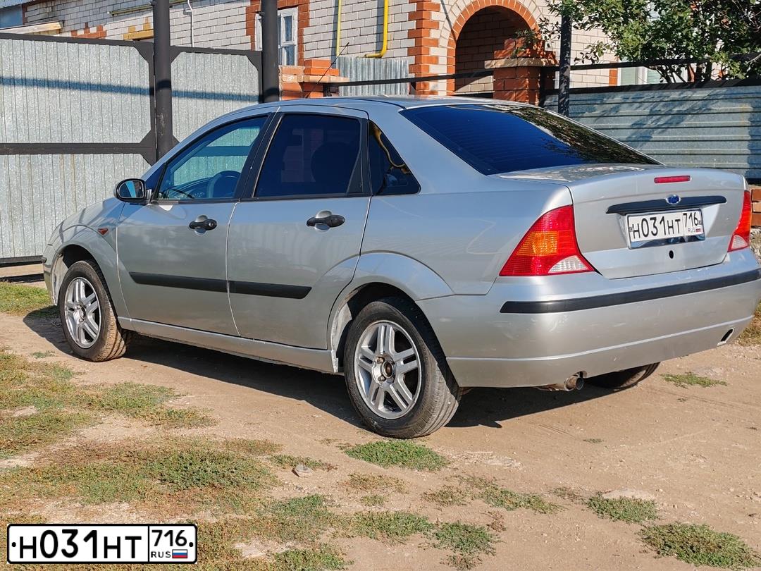 Фото автомобиля FORD FOCUS, 2003 — госномер Н031НТ716. Цвет: Серебристый