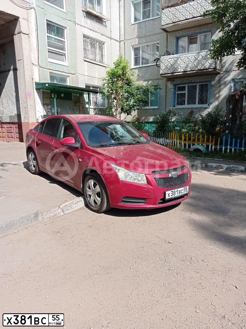 Фото автомобиля CHEVROLET CRUZE, 2009 — госномер Х381ВС55. Цвет: Красный