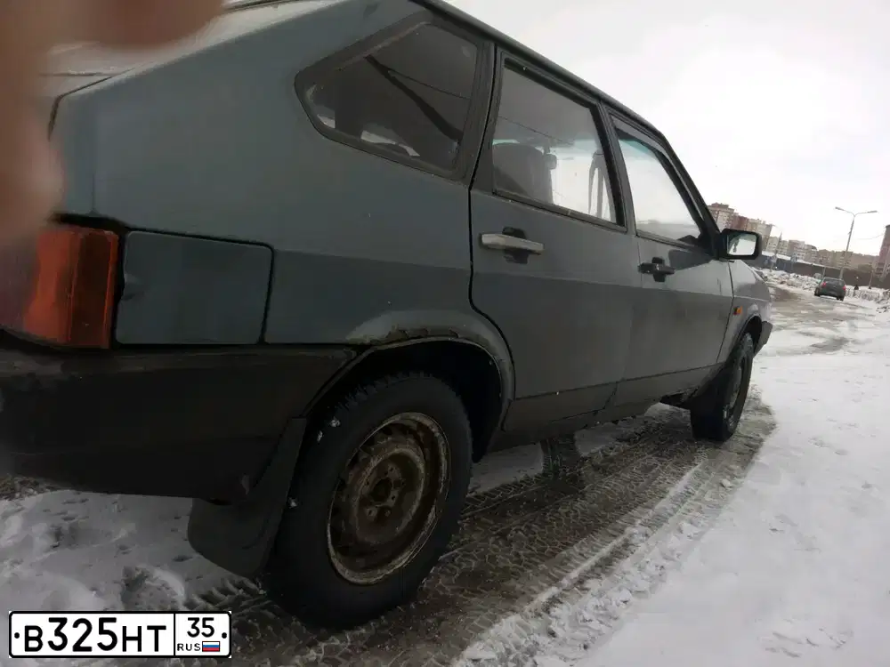 Фото автомобиля LADA 2109 SAMARA, 2001 — госномер В325НТ35. Цвет: СЕРО-СИНИЙ