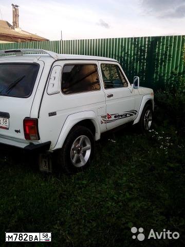 Фото автомобиля LADA 2121 NIVA, 2002 — госномер В375АР164. Цвет: ЯРКО-БЕЛЫЙ