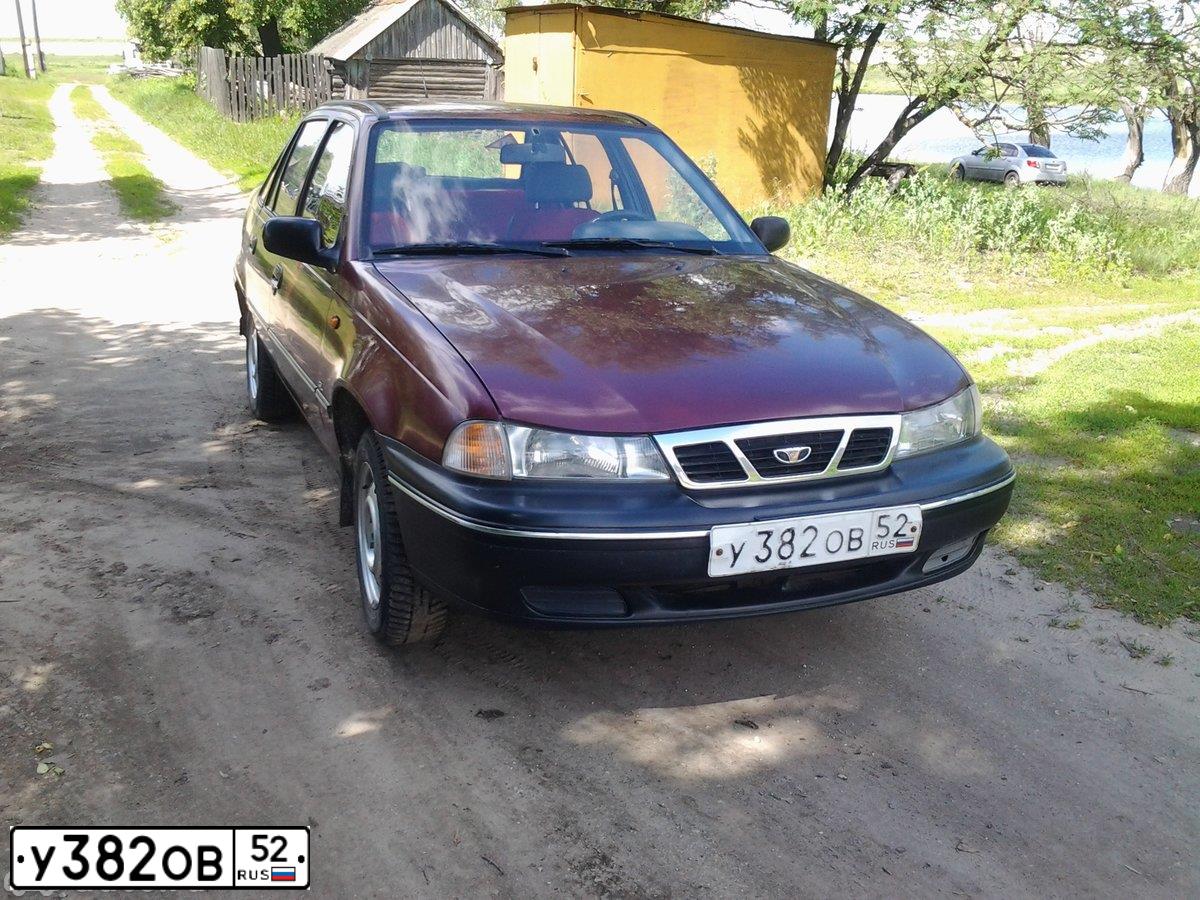 Фото автомобиля DAEWOO NEXIA, 2008 — госномер Р779ХА40. Цвет: СПЕЛАЯ ВИШНЯ