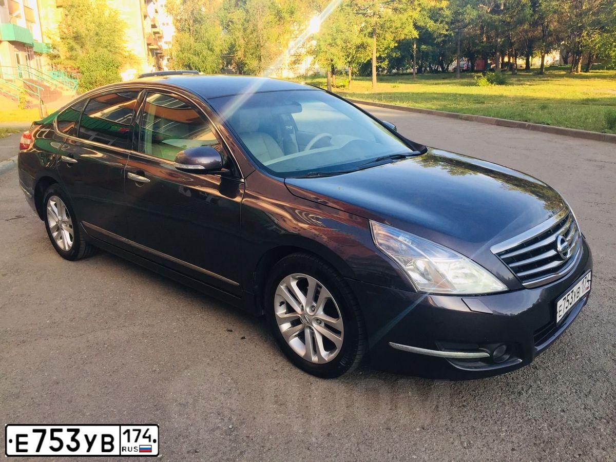 Фото автомобиля NISSAN TEANA, 2010 — госномер Р667ТС154. Цвет: СЕРО-СИРЕНЕВЫЙ