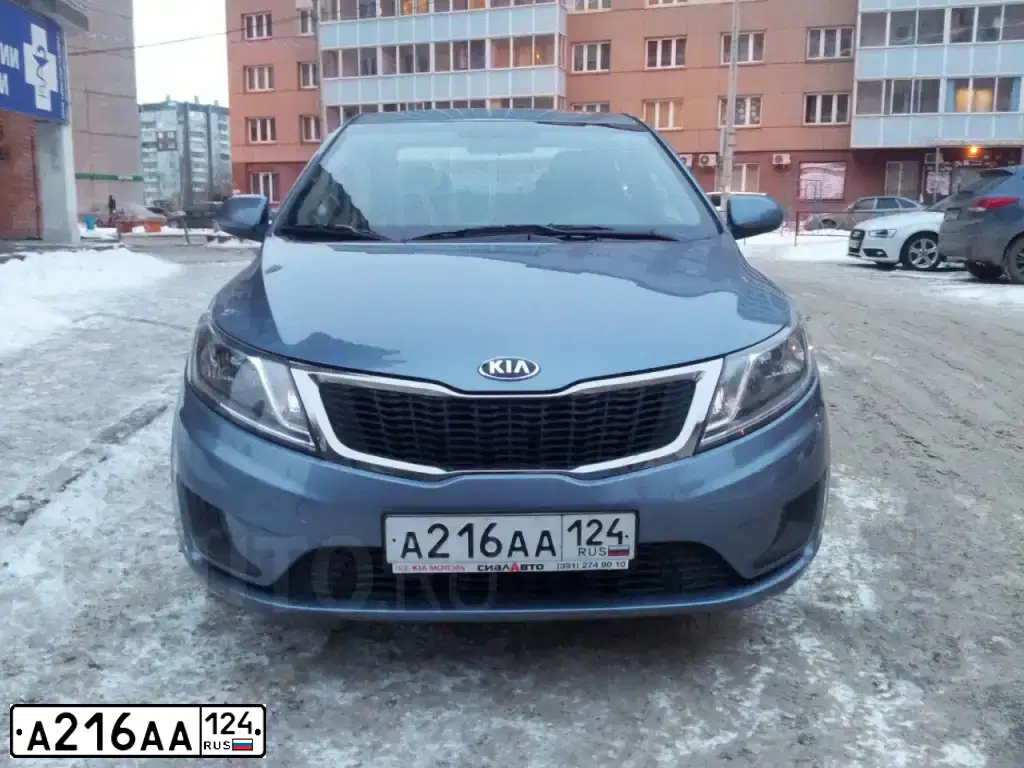 Фото автомобиля KIA RIO, 2014 — госномер А216АА124. Цвет: ГОЛУБОЙ