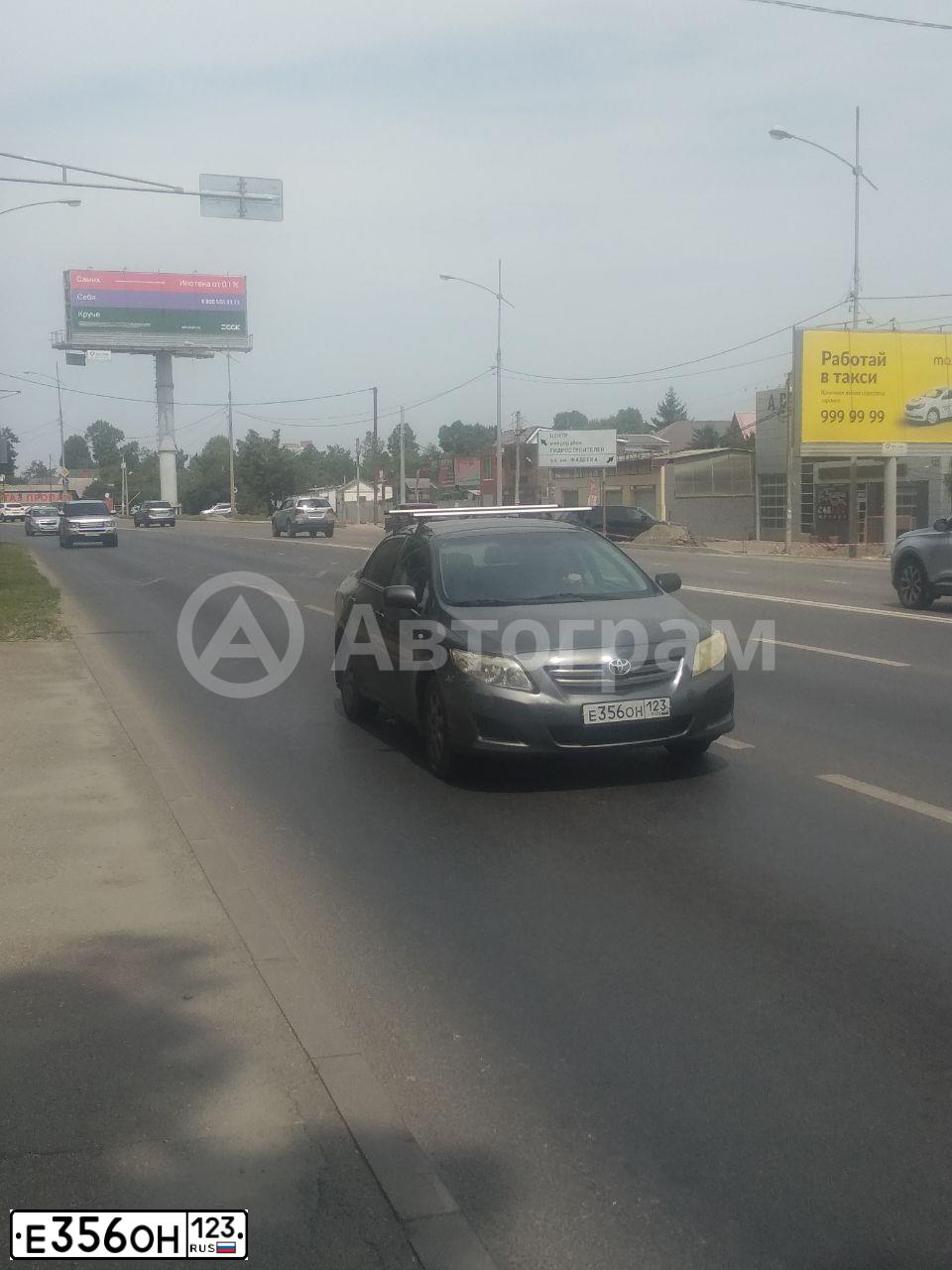 Фото автомобиля TOYOTA COROLLA, 2008 — госномер Е356ОН123. Цвет: СЕРЫЙ