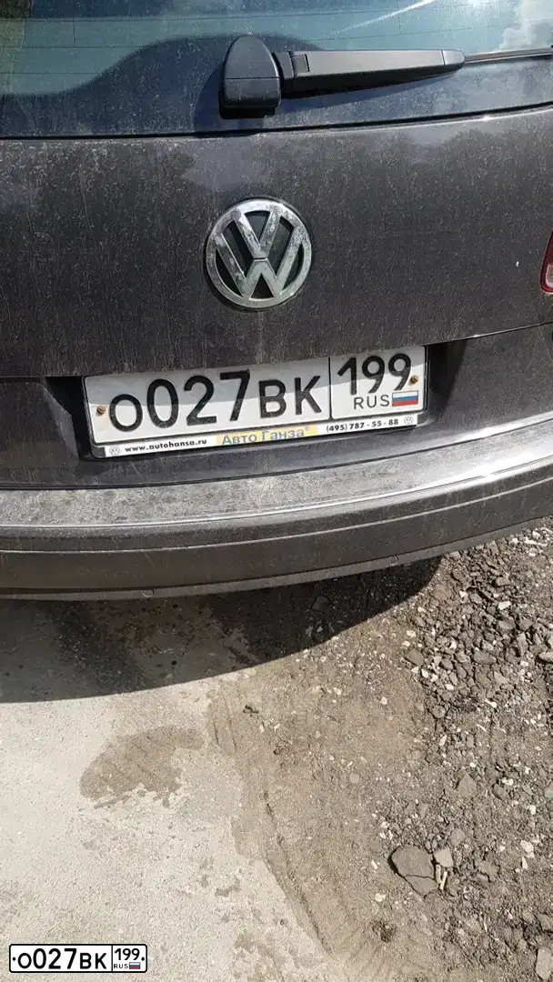 Фото автомобиля VOLKSWAGEN TOUAREG, 2008 — госномер О027ВК199. Цвет: ЧЕРНЫЙ